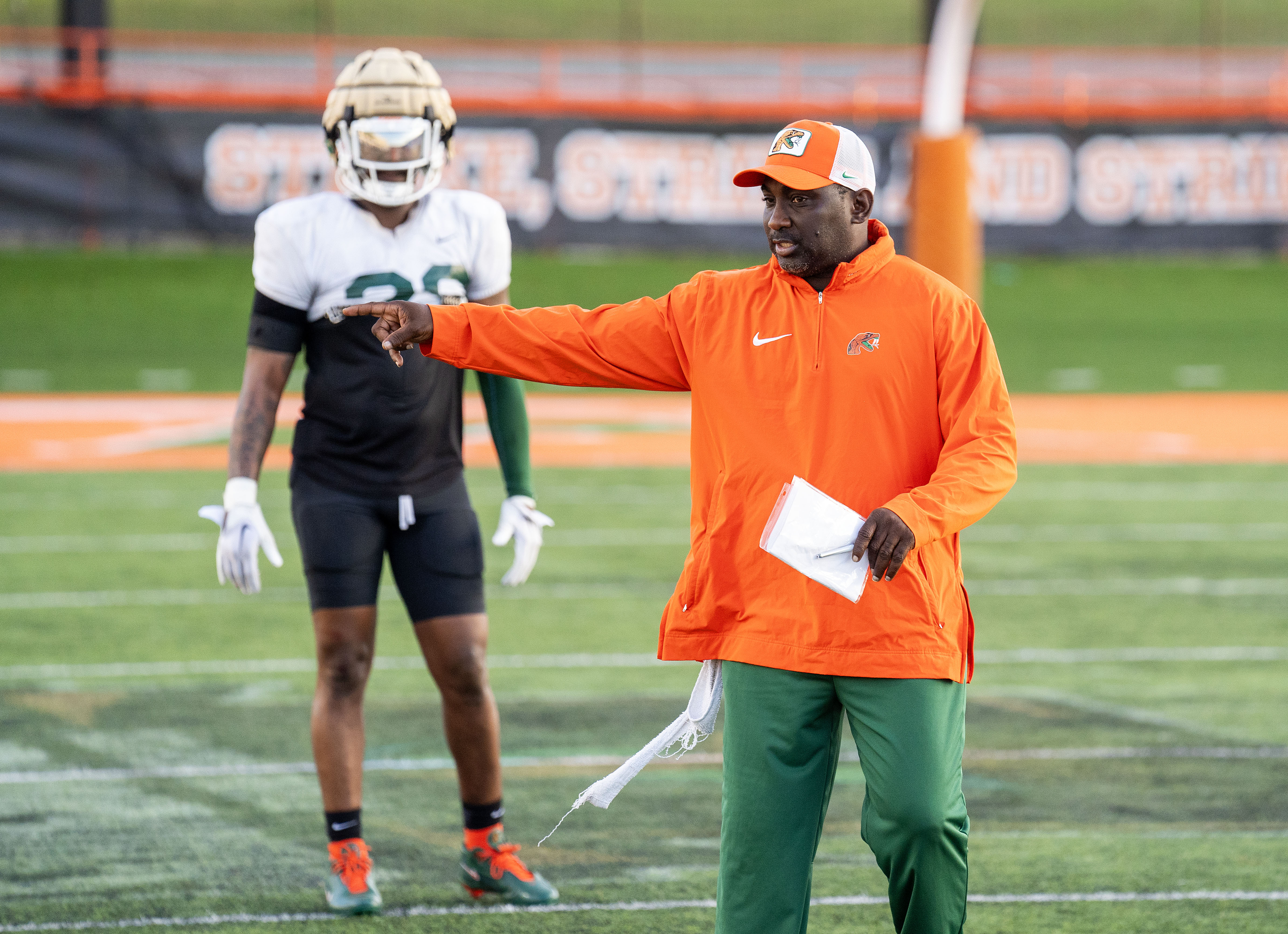 FAMU head coach James Colzie III directs players in practice.