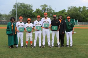 FAMU president presents baseball team with degrees on the field HBCU