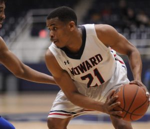 Howard hoops hangs on against American