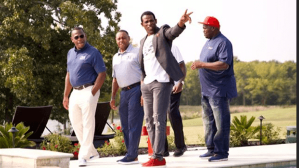 Deion Sanders walking with Jackson State administrators