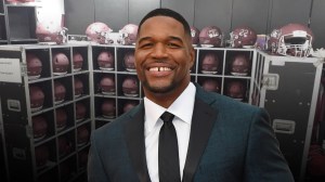 Michael Strahan donates helmets to his alma mater