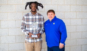 Pierre receives Protect Your Skull/HBCU Gameday D-II DPOTY Award