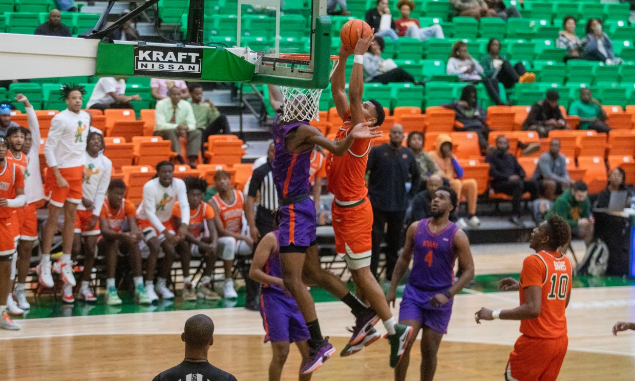 FAMU player Jaylen Bates throws down a dunk against Edward Waters in a game at the Al Lawson Center.