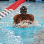 Olympic qualifier Miles Simon raising the bar for Howard Swimming