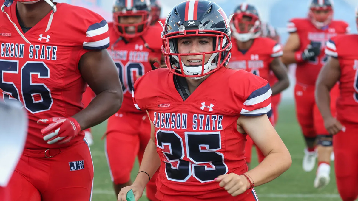 Leilani Armenta in a Jackson State red uniform.