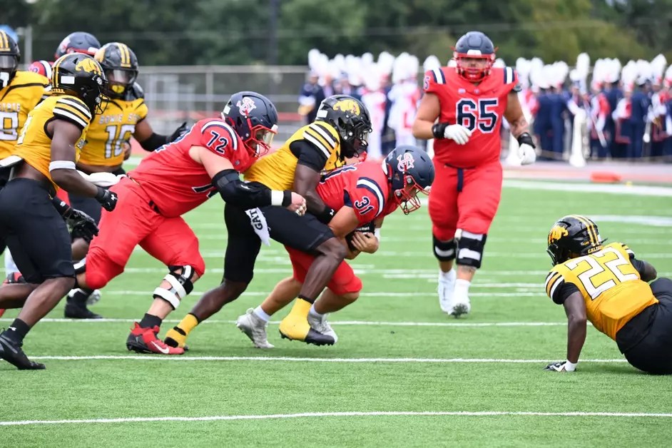 HBCU Bowie State defense tackles a player from Shippensburg