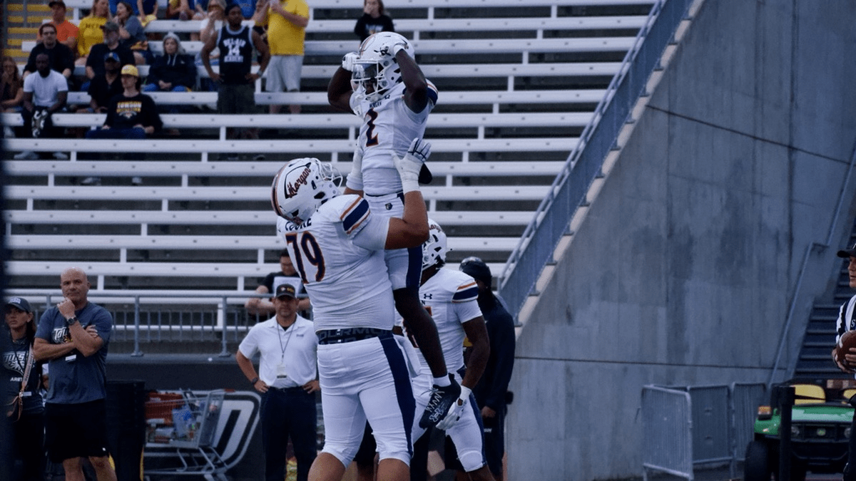 Morgan State football players celebrate during the Bears’ game against Towson.