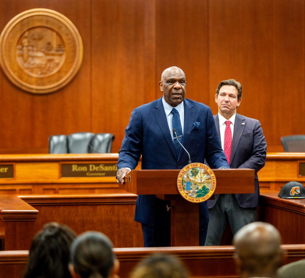 Andre Dawson Speak While FLorida Governor Ron DeSantis Looks On